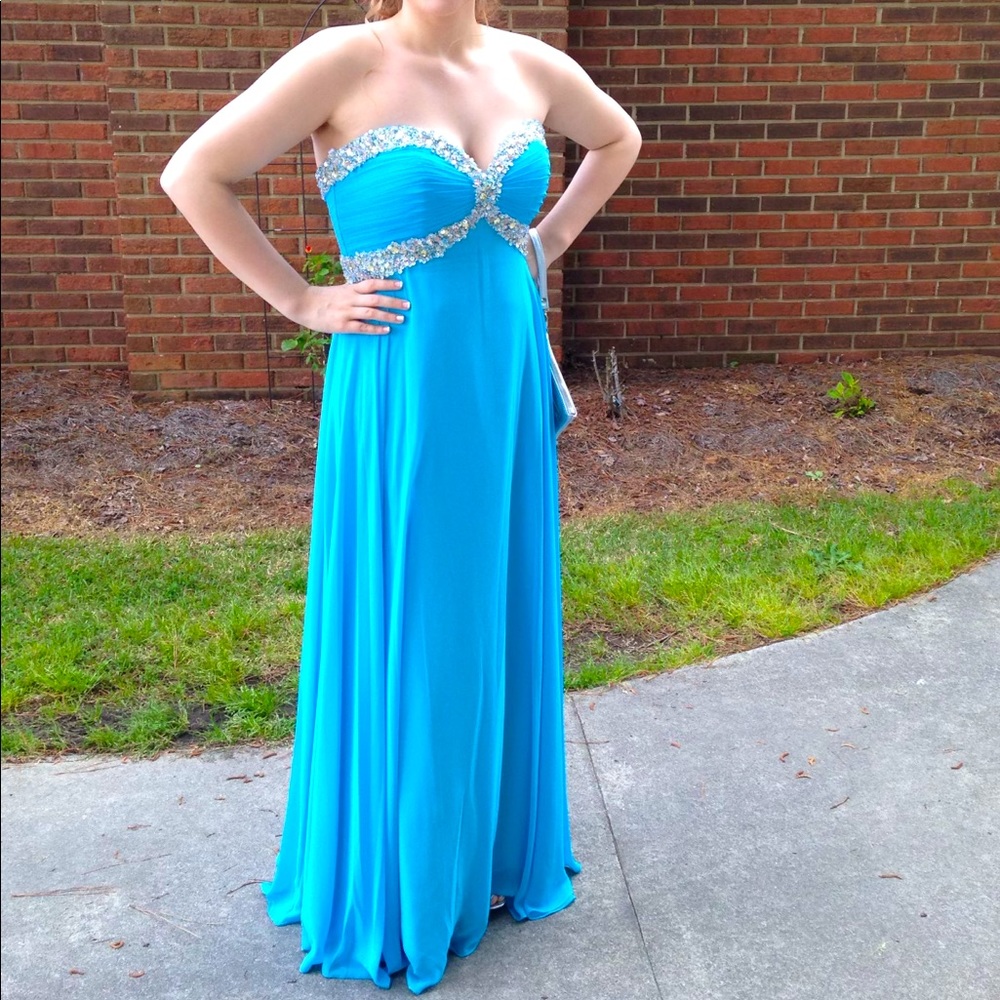 Aqua blue prom dress. Size 10. Brand is Night Moves. Only worn once. OBO
